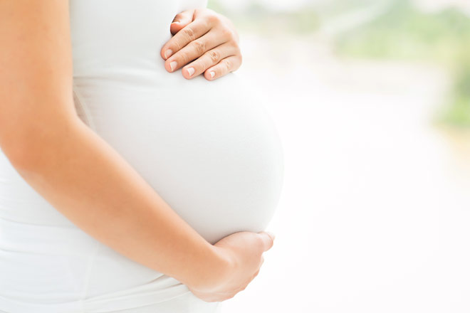 pregnant-woman-in-white-660x440